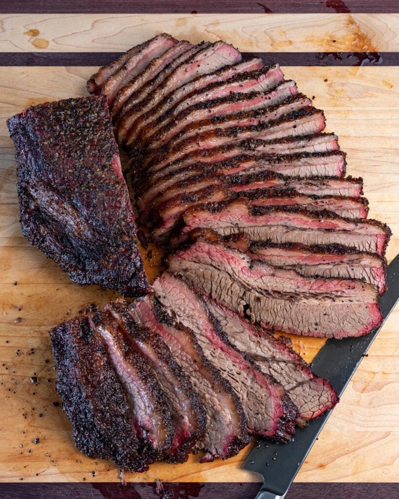 hickory smoked smoked brisket with knife 1200x1200